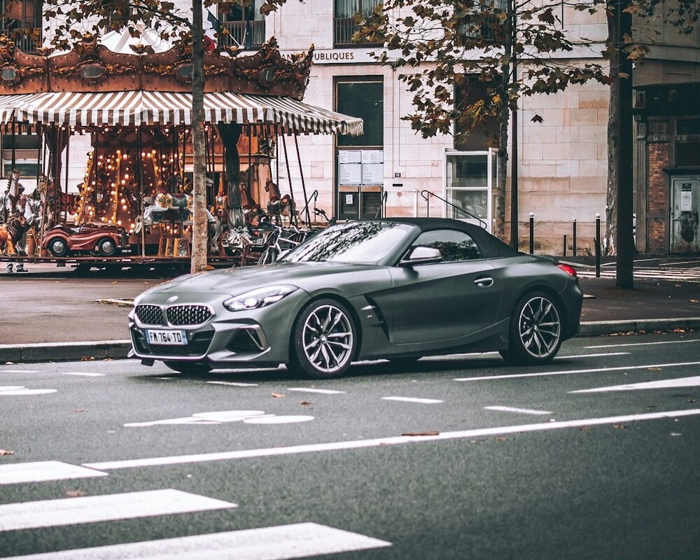 Rental car parked at a stoplight in France.