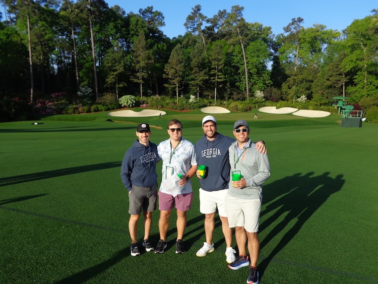 4 men at Amen Corner at Augusta National