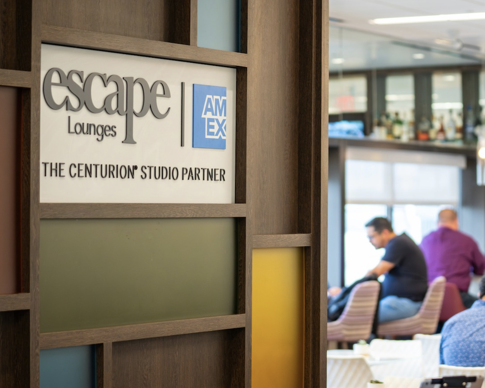 Amex partner logo in an Escape Lounge.
