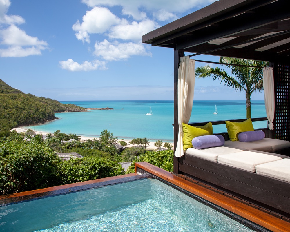 You can use free night certificates at SLH properties, such as Hermitage Bay in Antigua. Credit: Hilton