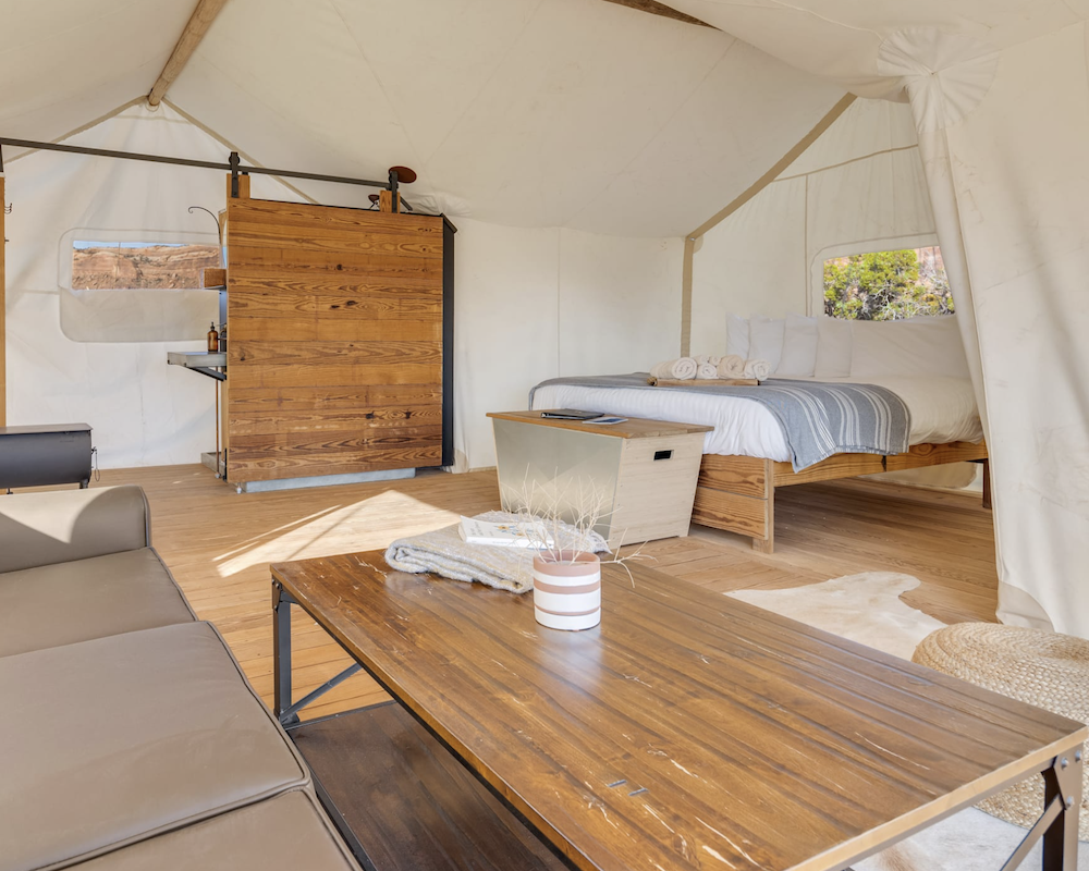 Bedroom in a tent at the Under Canvas Moab.
