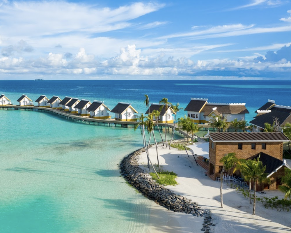 Aerial view of the villas at the SAii Lagoon Maldives, Curio Collection by Hilton.