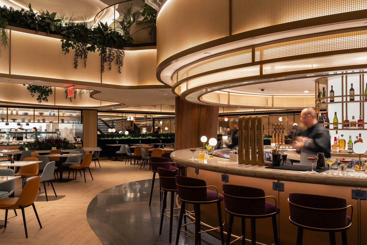 A photo of the Chase Sapphire Lounge at New York-LaGuardia airport showing the bar and dining area.
