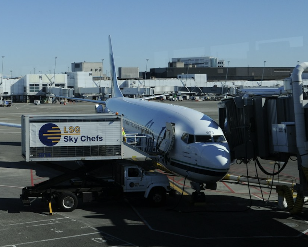 LSG Sky Chefs refilling an Alaska Airlines jet
