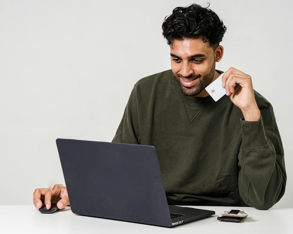 Man Holding His Credit Card