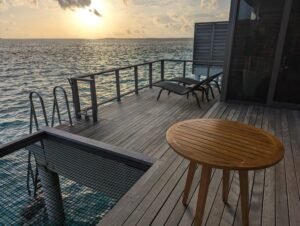Sunset from an overwater villa at the Le Meridien Maldives