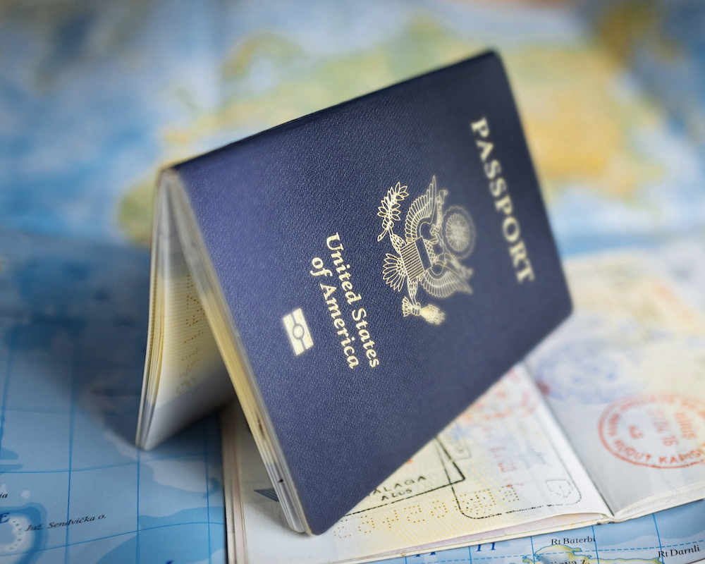 Picture of a U.S. passport on a map.