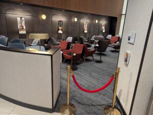 Delta One Lounge Boston living room seating area roped off