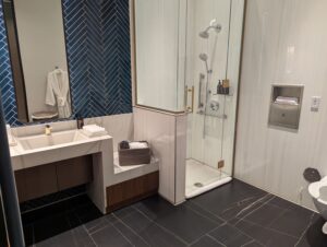 Delta One Lounge Boston showers