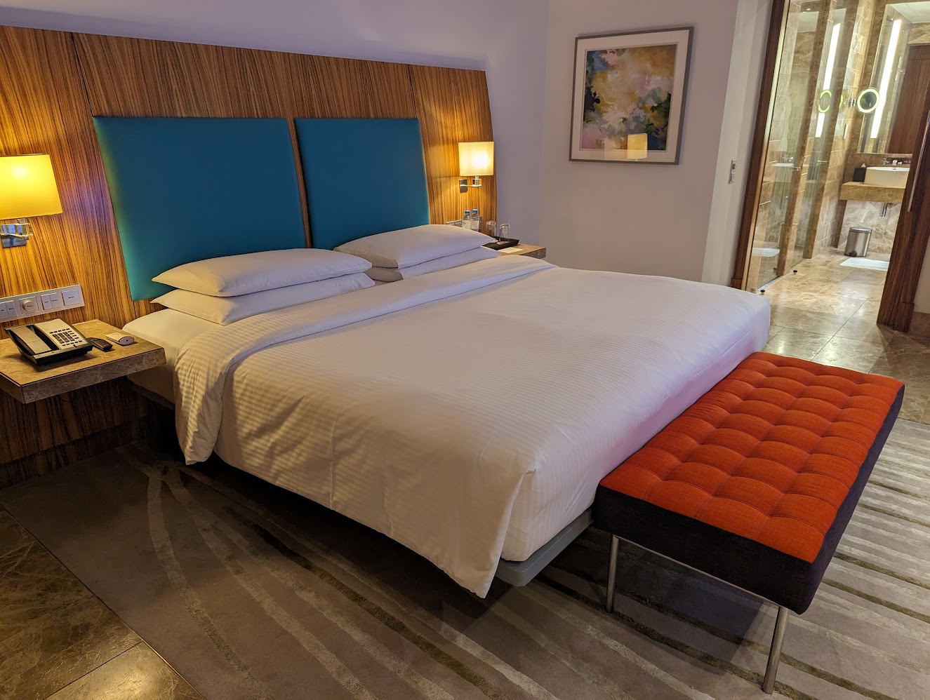 Photo of a bedroom in the Andaz Capital Gate Abu Dhabi