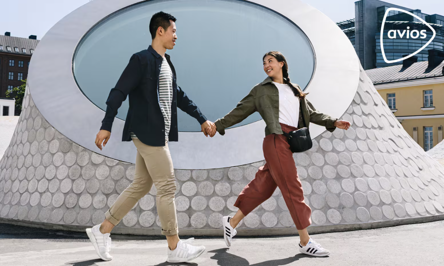 A photo shows a couple holding hands and a logo for Avios