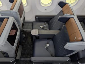 American Airlines Boeing 787-9P premium economy window seat with one seat reclined