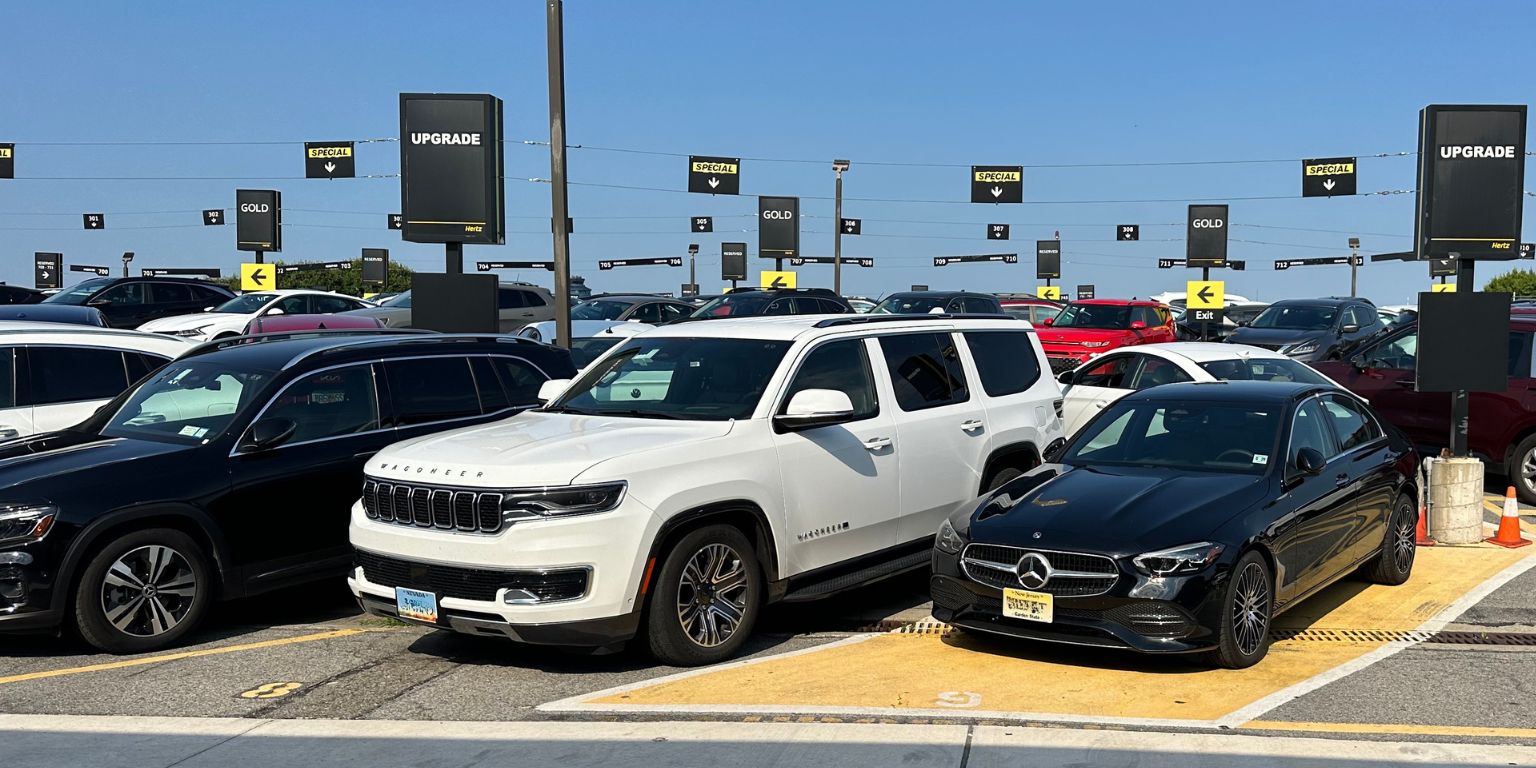 Upgraded vehicles on the lot at a Hertz location.