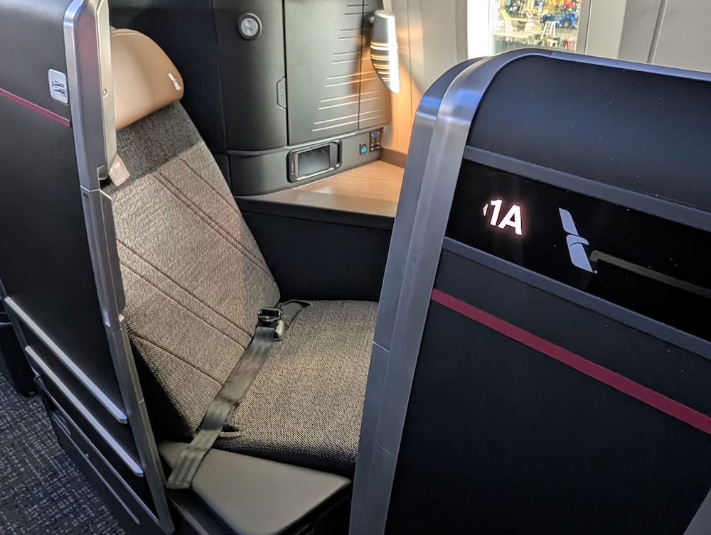 American Airlines 787-9P Flagship Suite and sliding exterior door.