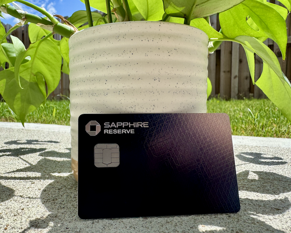 Chase Sapphire Reserve next to a potted plant.