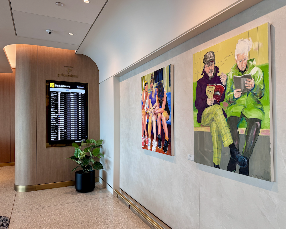 Capital One Lounge at JFK artwork and departure board.