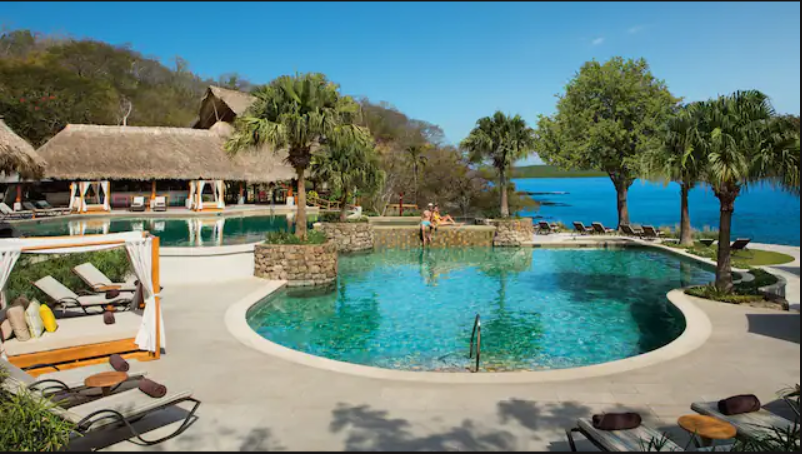 Pool overlooking ocean at Secrets Papagayo