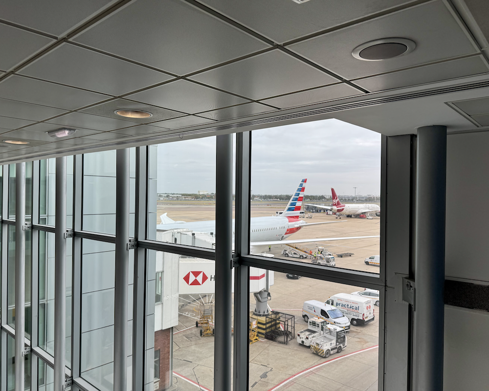 American Airlines 787-9P as seen through LHR windows.