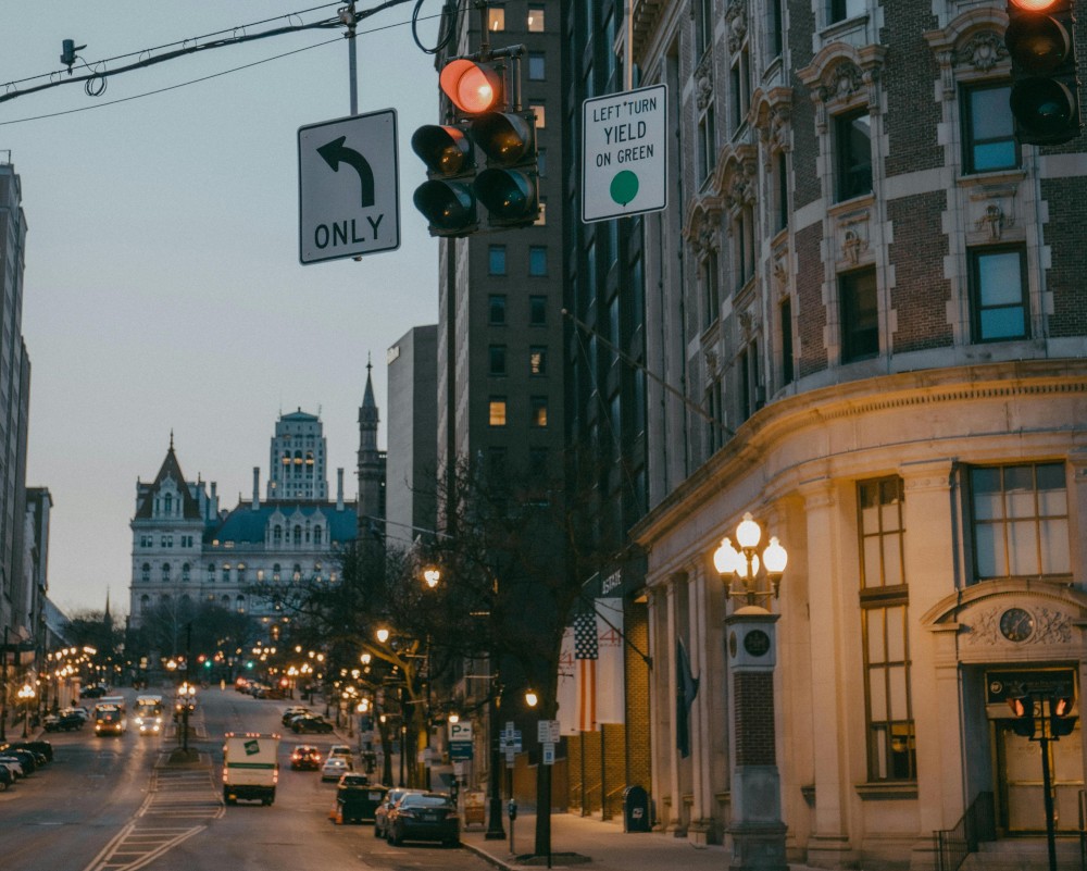 A photo shows a street in Albany NY with a traffic light.