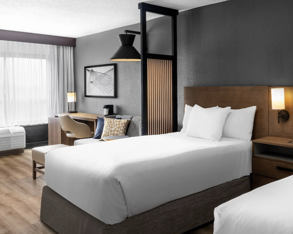 Hyatt Place Orlando Airport bedroom.