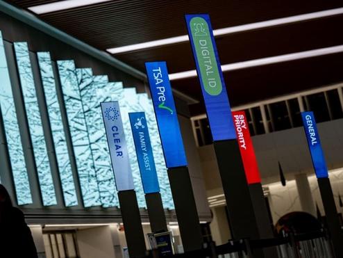 A photo showing security screening program lanes, including CLEAR, family assist, TSA PreCheck, Digital ID, Sky Priority, and general.