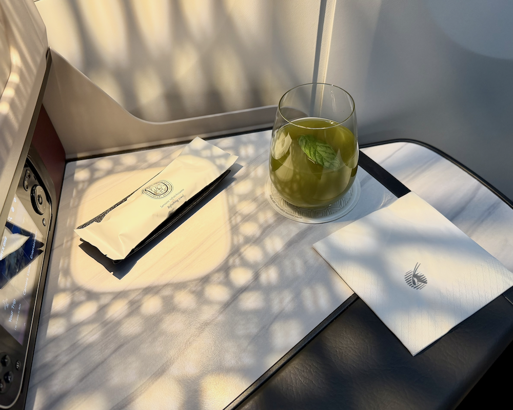 Qatar Airways 787-9 pre-departure beverage.