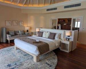 Bedroom in an overwater villa at Baros Maldives