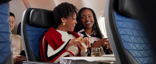 A photo of two women on a Delta flight.