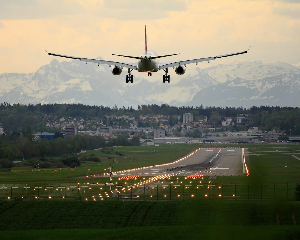 airplane landing at dusk