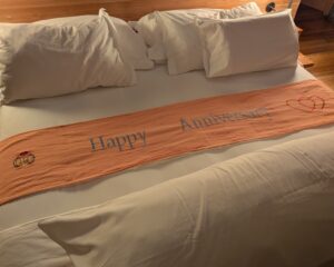 Happy anniversary bed decorations at Six Senses Laamu in the Maldives