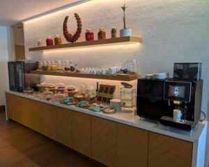 Snacks and drinks in the Six Senses Laamu lounge at the sea plane terminal