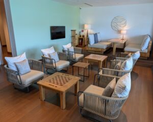 Seating in the Six Senses Laamu sea plane terminal lounge