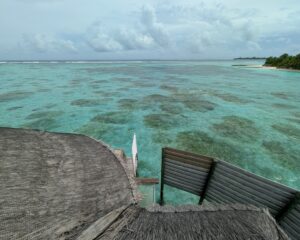 View from the upstairs deck of an overwater villa at Six Senses Laamu in the Maldives