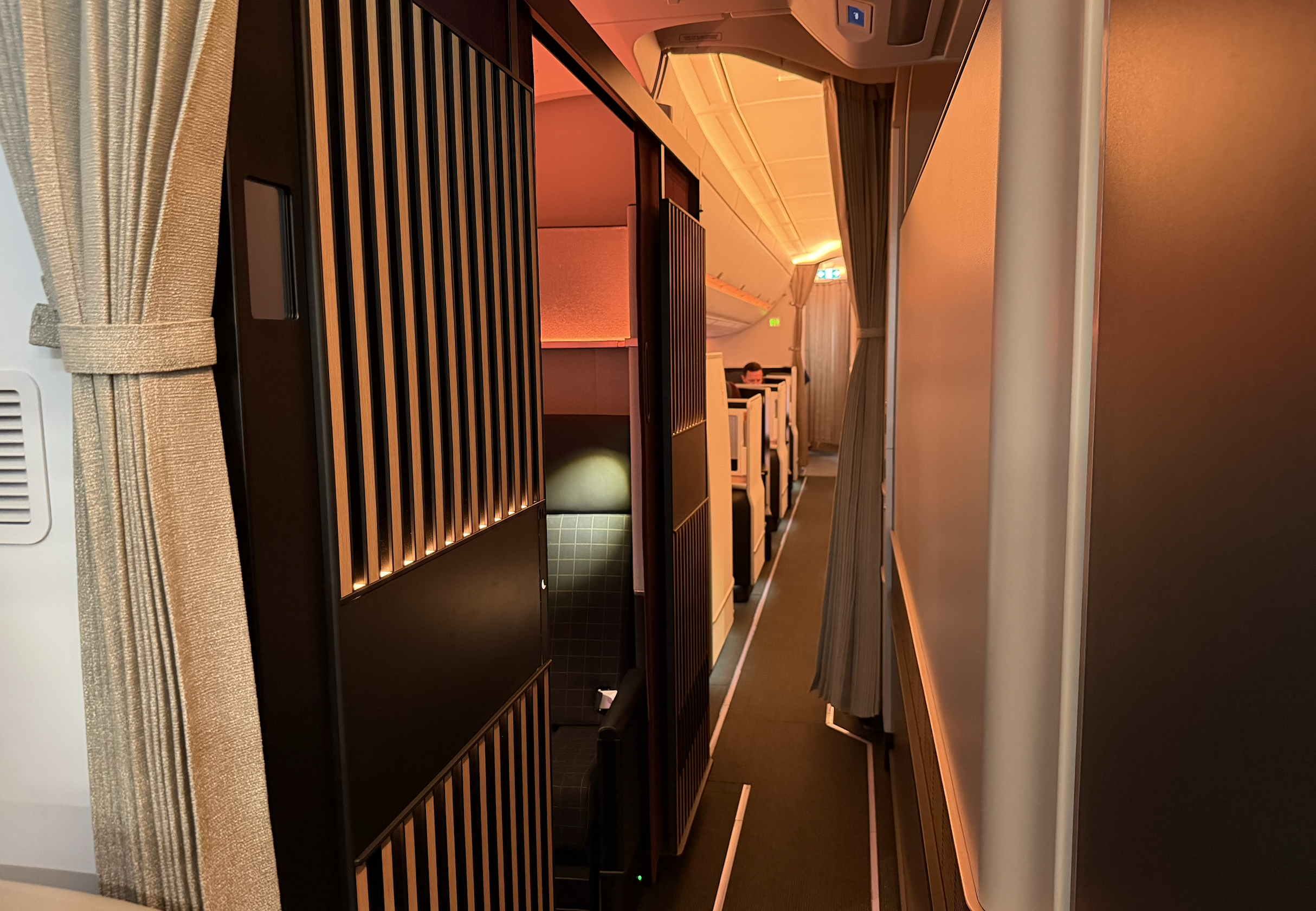 Down-aisle view of SWISS A350 first class suite