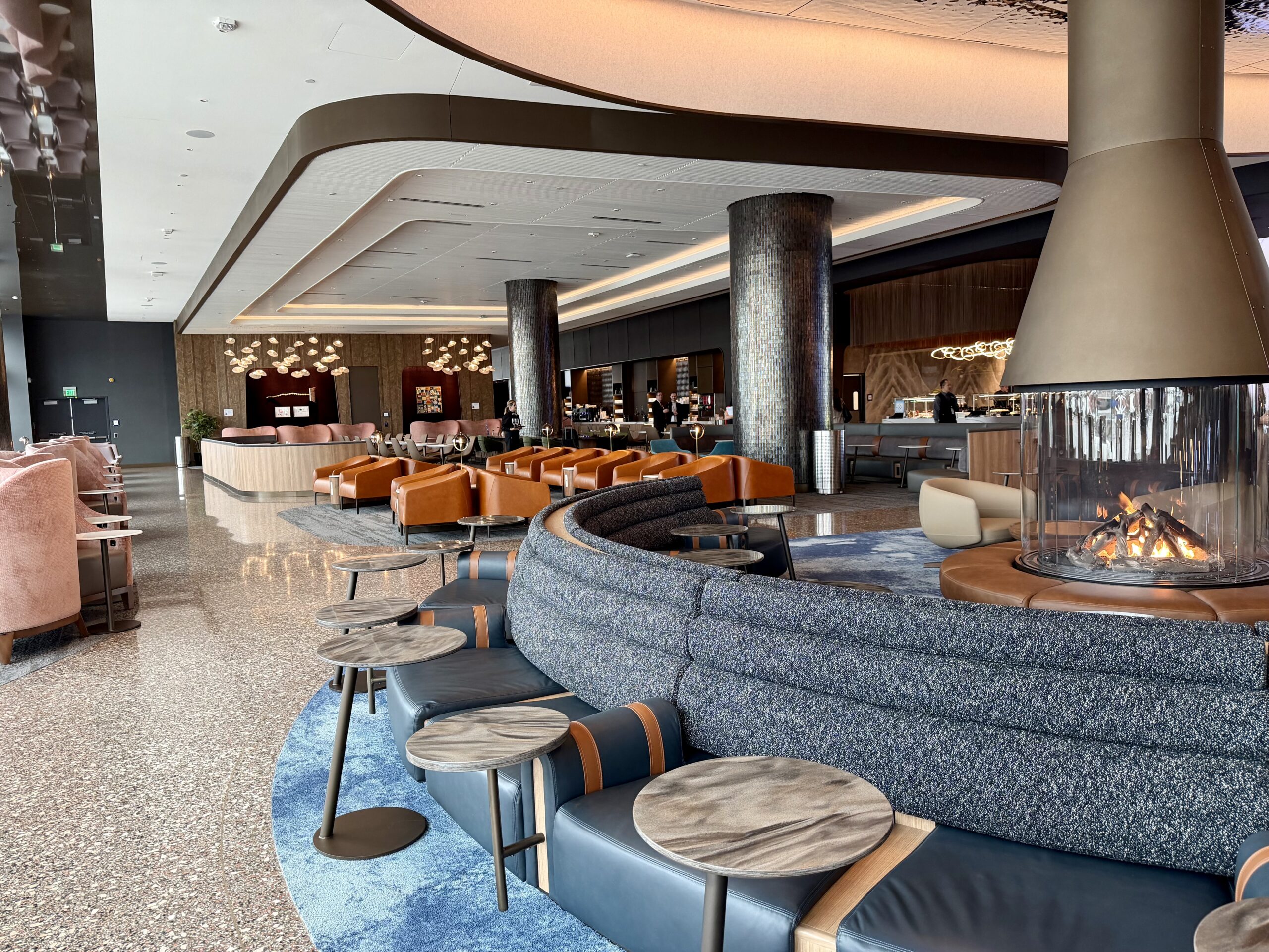 Delta Sky Club SLC Concourse B central seating area and fireplace.