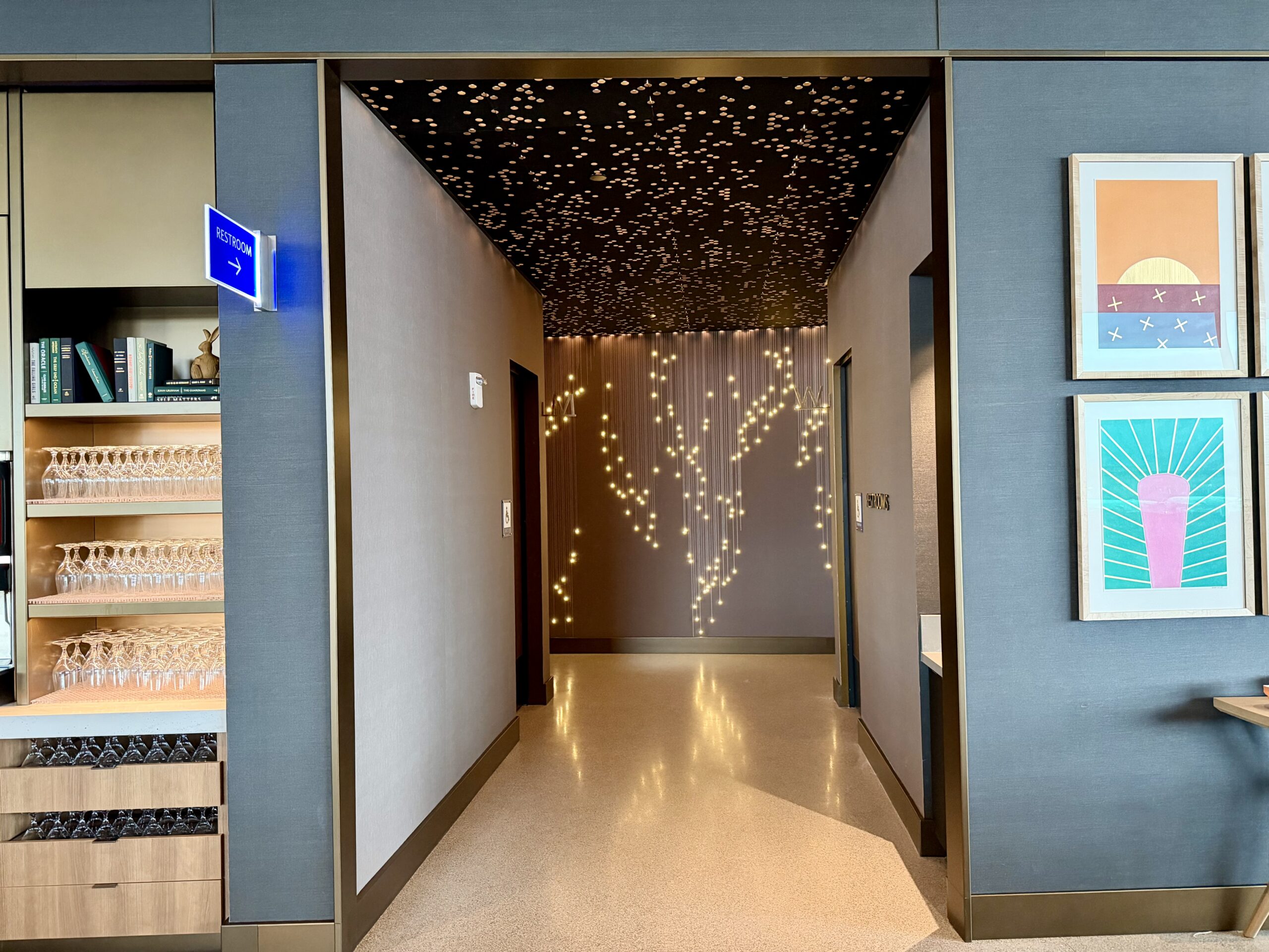 Delta Sky Club SLC Concourse B restroom hallway.