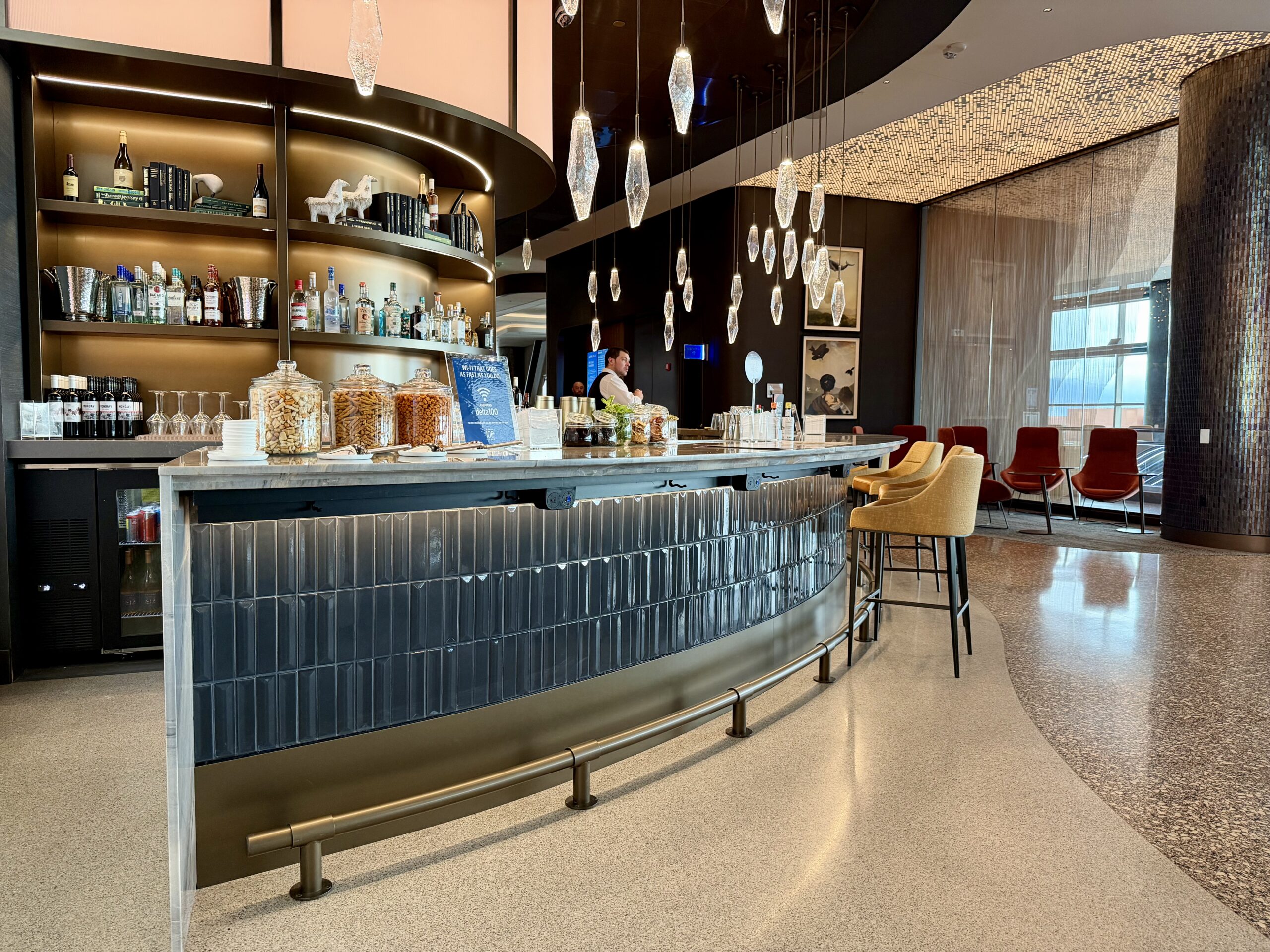 Delta Sky Club SLC Concourse B wrap-around bar.