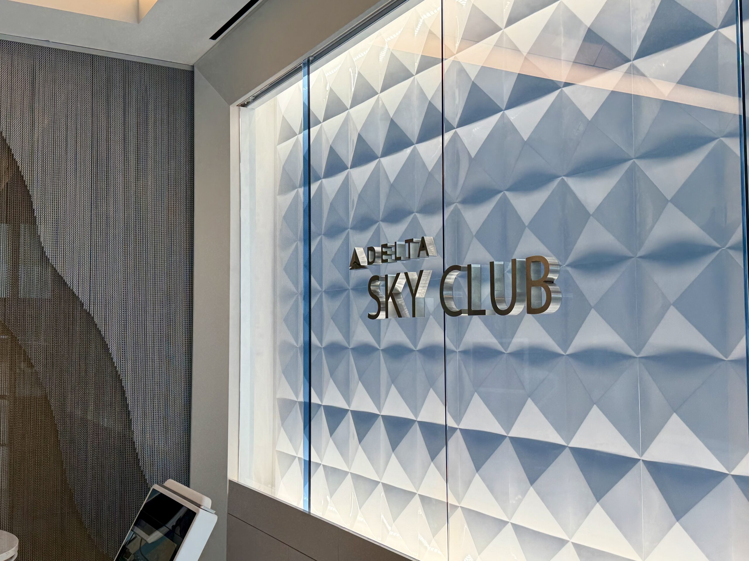 Delta Sky Club SLC Concourse B entry branding.