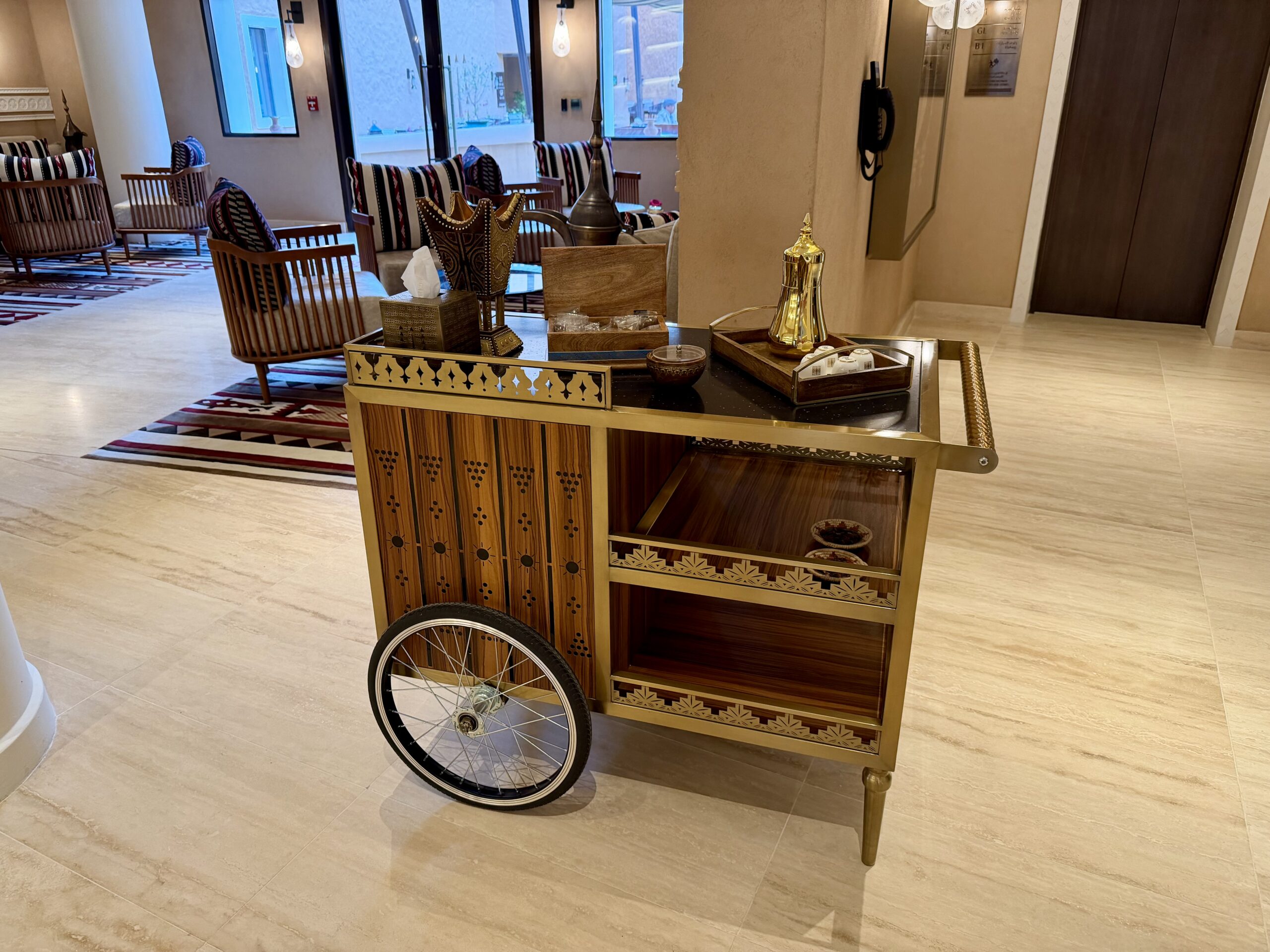 Bab Samhan Hotel lobby cart with coffee and dates.
