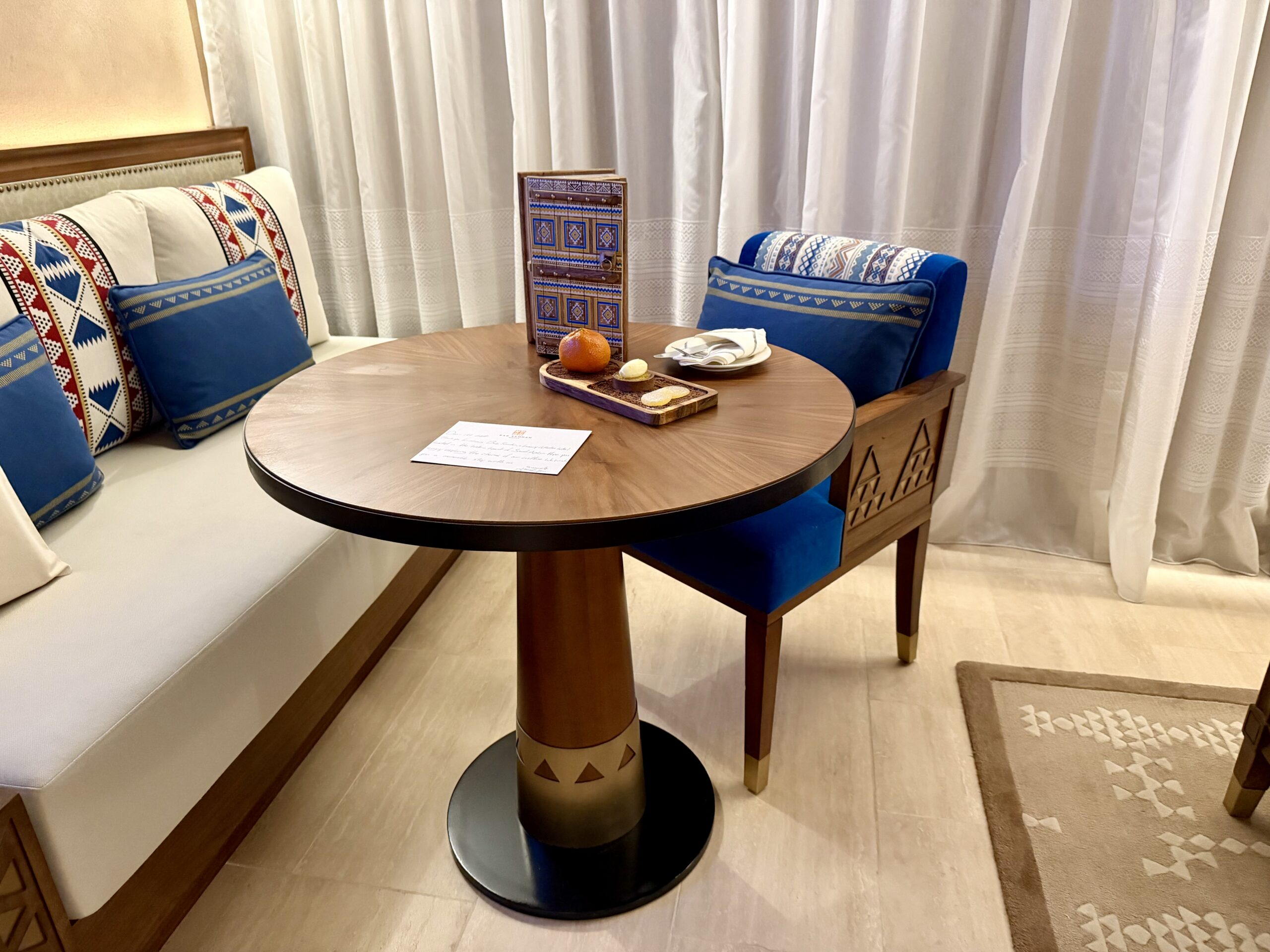 Bab Samhan Hotel in-room seating area.