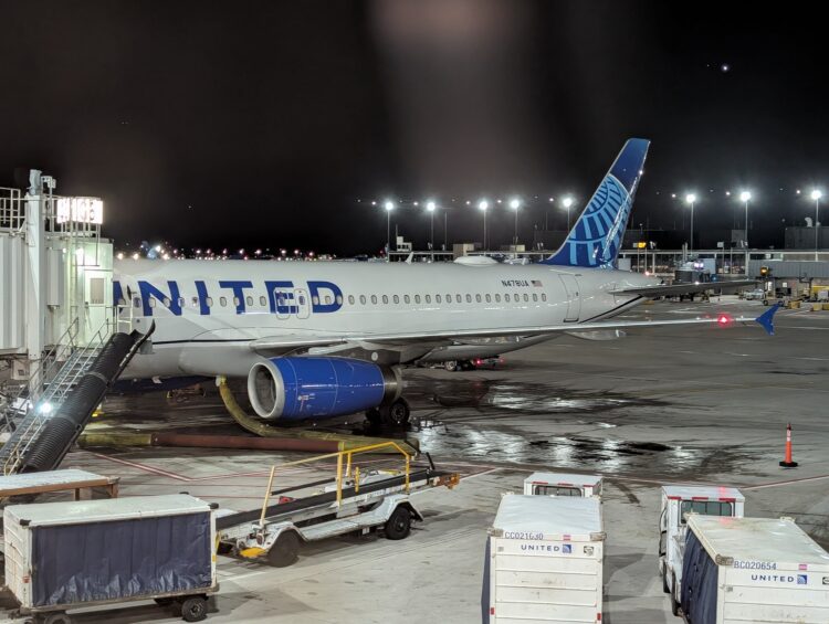 Photo of United Boeing 737 MAX parked at Chicago O'Hare gate G5