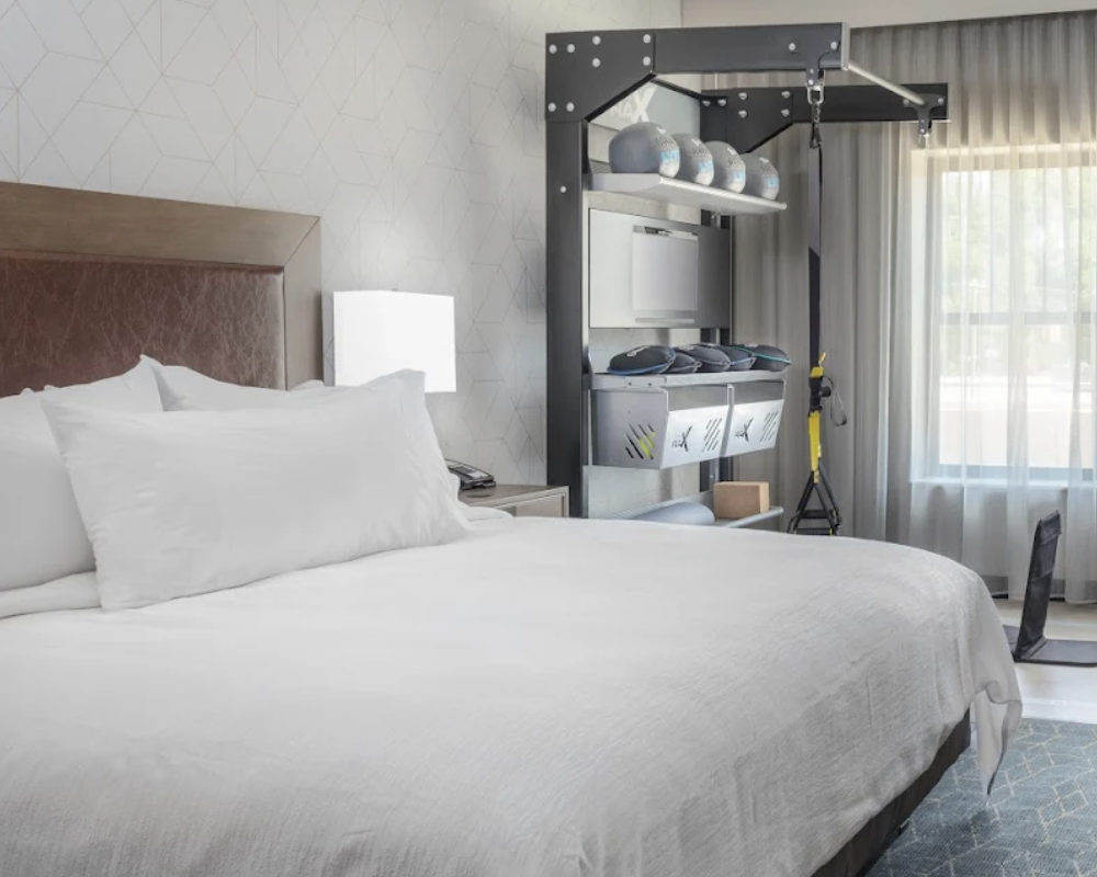 Fitness-themed bedroom at the Embassy Suites by Hilton Grand Rapids Downtown.