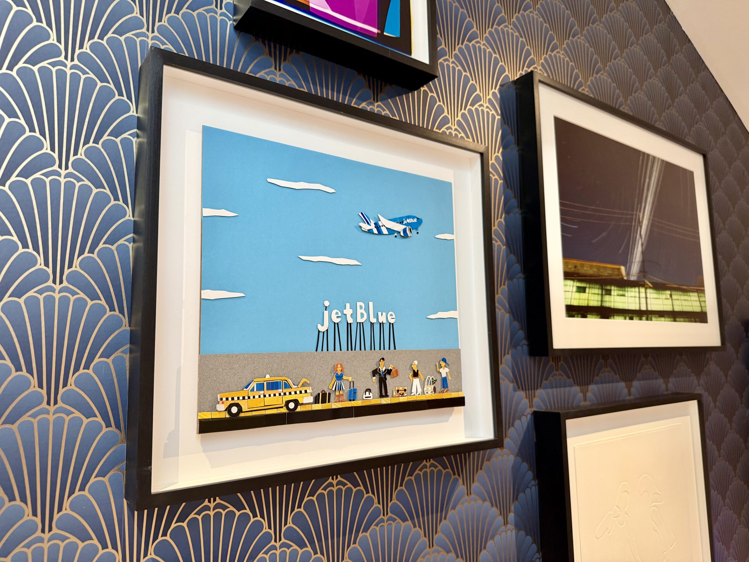 JFK BlueHouse lounge artwork.
