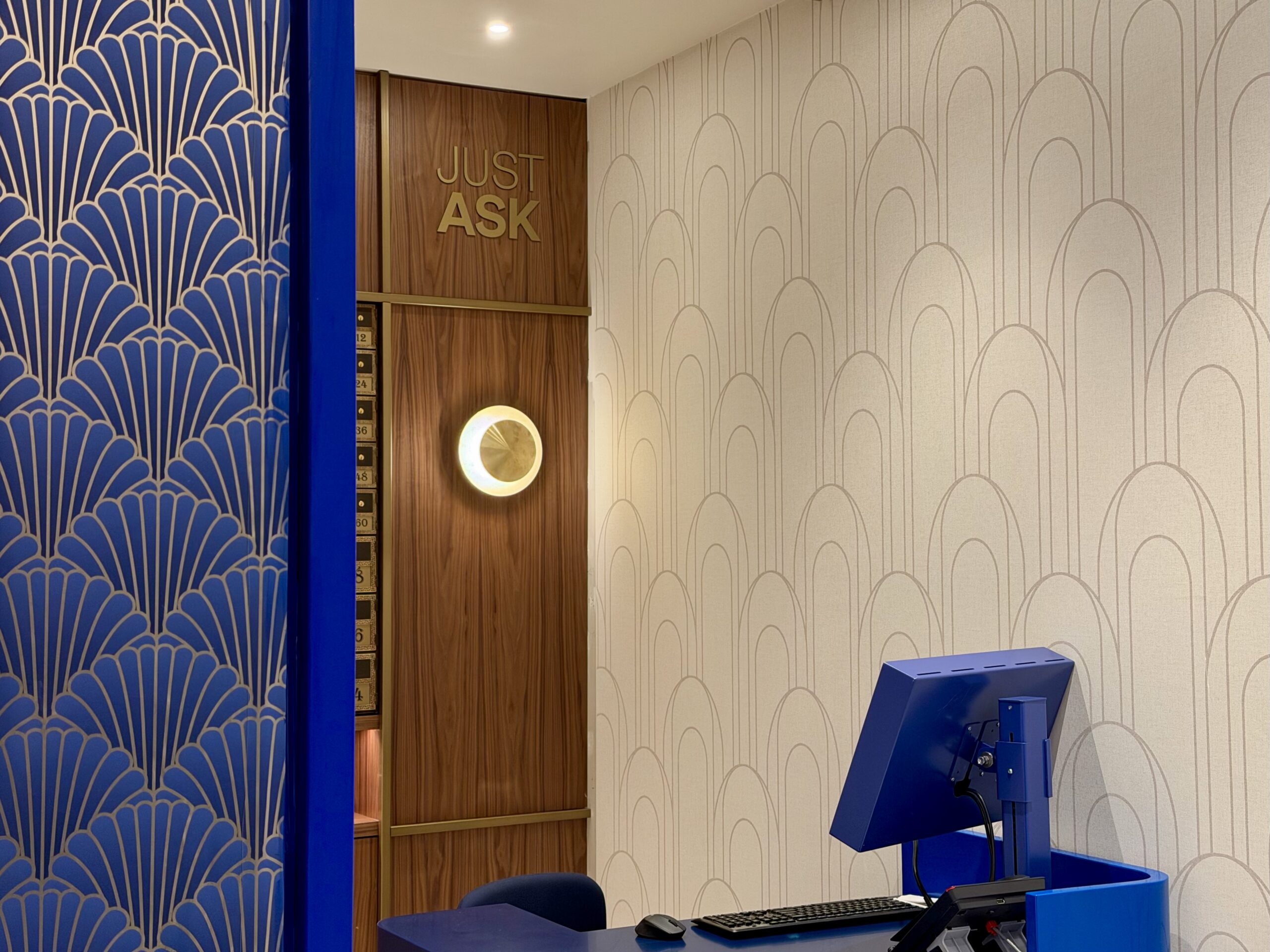 JFK BlueHouse lounge Just Ask desk.