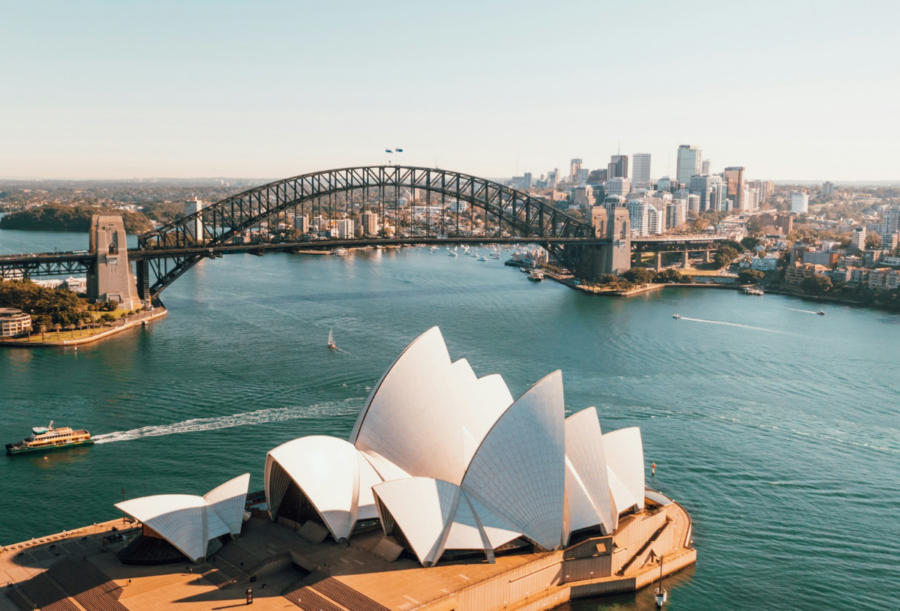 A view of the Sydney cityscape with the Sydney Opera House in the foreground