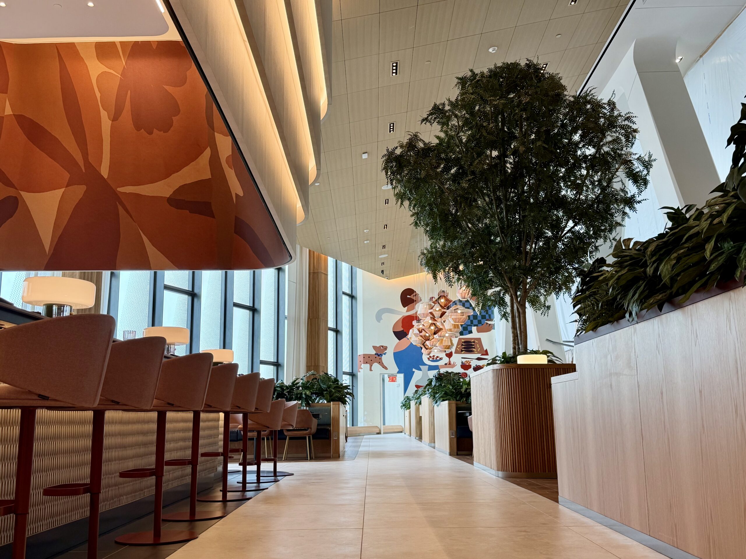 Wide-angle photo of the Capital One Landing Lounge at LGA.