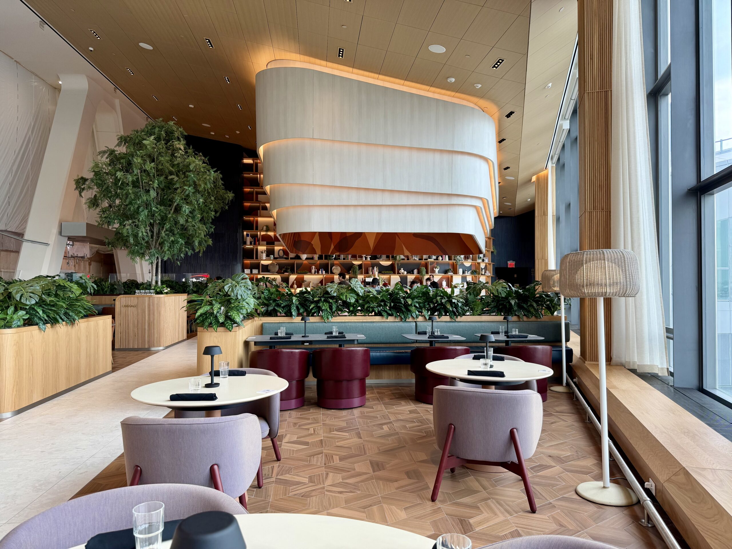 Wide angle shot of the Capital One Landing Lounge at LGA.