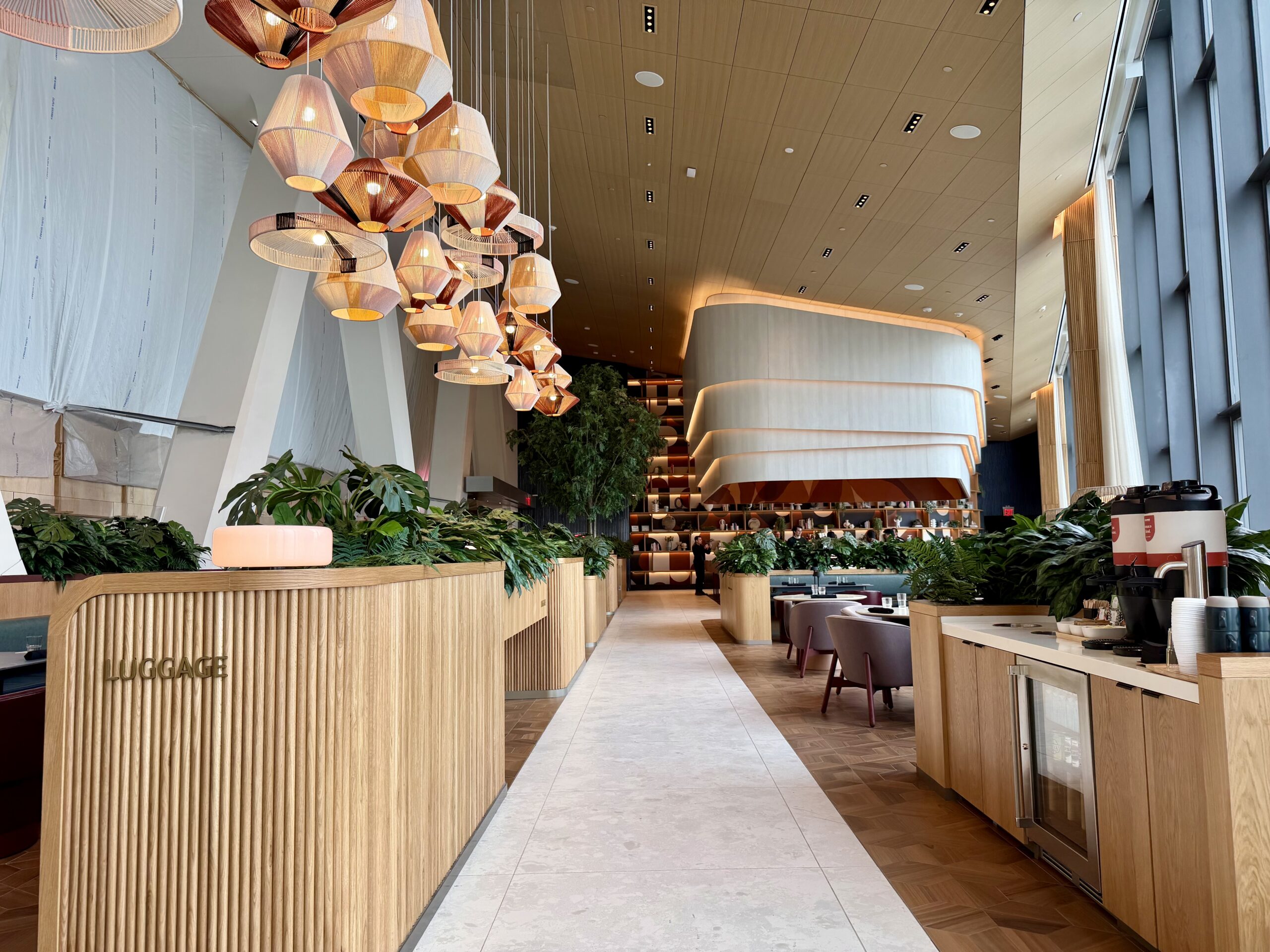 Wide-angle photo of the Capital One Landing Lounge at LGA.