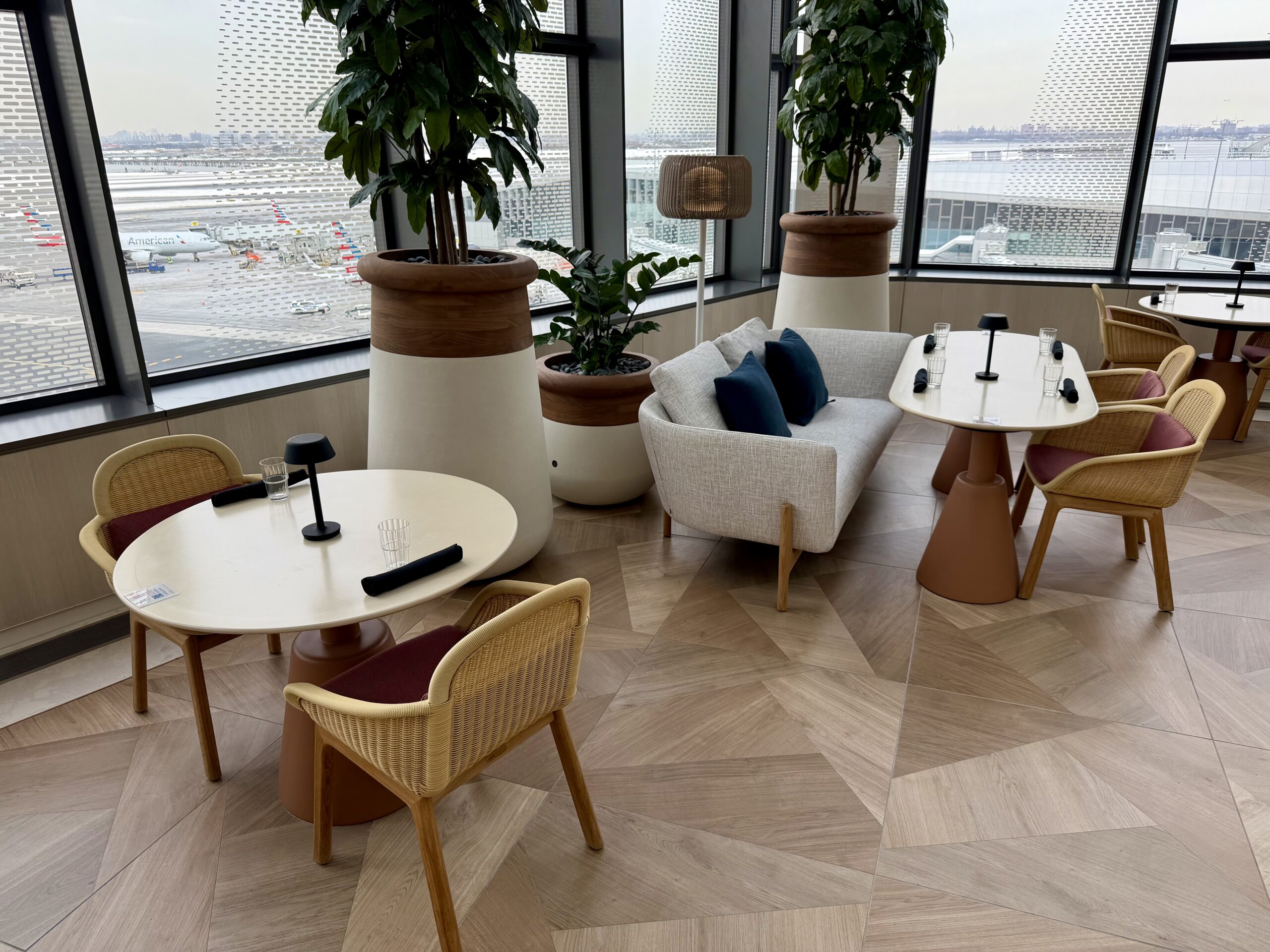 Tables at the Capital One Landing Lounge at LGA.