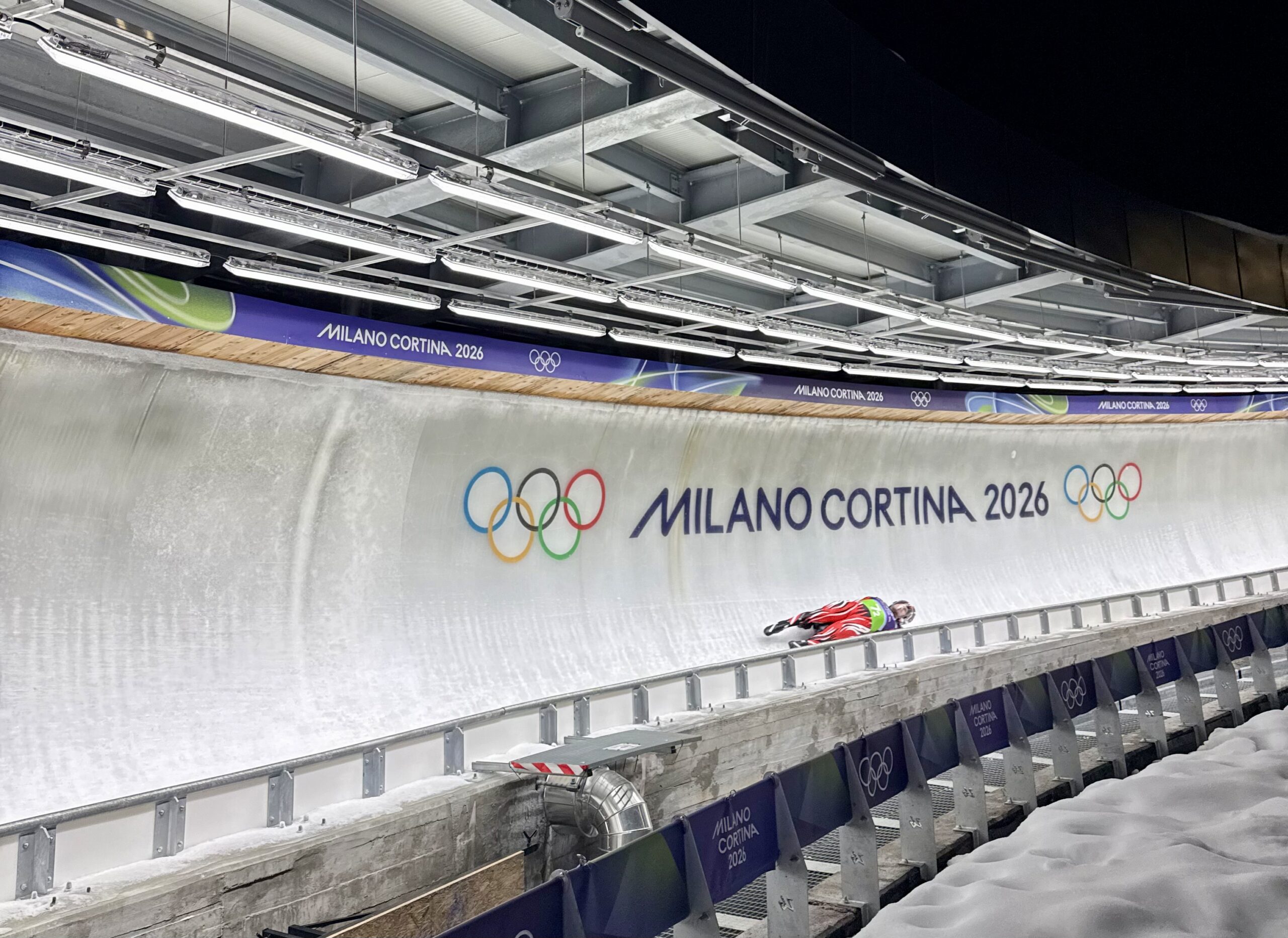 An athlete competing in a luge event at the Milan Cortina 2026 Winter Olympics
